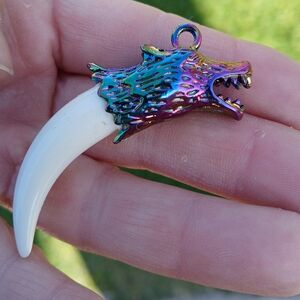 New Rainbow Hematite and Imitation Bovine Bone Wolf Claw Fang Pendant.